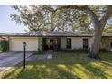House exterior showcasing the front entrance at 2227 Willowbrook Dr, Clearwater, FL 33764