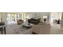 Stylishly furnished living room featuring modern decor and a relaxing ambiance at 3076 Eastland Blvd # 106, Clearwater, FL 33761