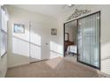 Sunroom with access to bedroom and view of backyard at 37820 Alissa Dr, Zephyrhills, FL 33542