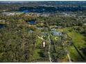 Aerial view showing home and surrounding property at 1835 S Keene Rd, Clearwater, FL 33756