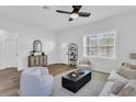 Bright living room with comfy seating and a modern coffee table at 1104 W Sitka St, Tampa, FL 33604