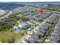 Aerial view of house location within residential community at 17036 Peaceful Valley Dr, Wimauma, FL 33598