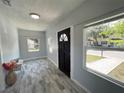 Bright and airy front entry with tile flooring and ample natural light at 1114 Palm Bluff St, Clearwater, FL 33755