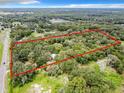 Aerial view of large wooded lot for sale at 16206 Boyette Rd, Riverview, FL 33579