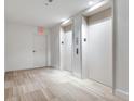 Modern hallway with two elevators and exit at 2912 W Santiago St # 2204, Tampa, FL 33629