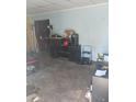 Living room with cluttered floor and various items at 321 77Th Ave, St Pete Beach, FL 33706