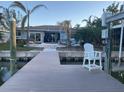 Private dock and backyard access to the canal at 8060 Gulf Blvd, St Pete Beach, FL 33706