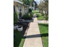 Concrete walkway leading to home entrance at 3402 W Obispo St, Tampa, FL 33629