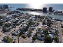 An aerial view of a neighborhood with waterfront homes at 507 79Th Ave, St Pete Beach, FL 33706