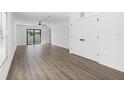 Bright and spacious living area with sliding glass doors to the backyard at 29546 Fedora Cir, Brooksville, FL 34602