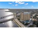 Stunning aerial view of the condominium building and surrounding cityscape with water views at 345 Bayshore Blvd # 308, Tampa, FL 33606