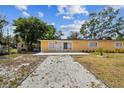 Inviting single-story home with a clean front yard and convenient driveway access at 3414 Lindsey St, Dover, FL 33527