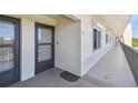 Condo building hallway with door to unit at 8198 Terrace Garden N Dr # 403, St Petersburg, FL 33709