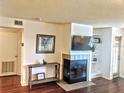 Living room featuring a fireplace and built in shelving at 10200 Gandy N Blvd # 921, St Petersburg, FL 33702