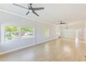 Open concept living and dining area with hardwood floors at 2905 E 21St Ave, Tampa, FL 33605