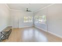 Bright and spacious living area with hardwood floors and ceiling fan at 2905 E 21St Ave, Tampa, FL 33605