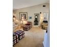 Living room with comfortable seating and large artwork at 4632 Red Maple Rd # 1204, Bradenton, FL 34210