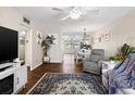 Living room with hardwood floors, comfortable furniture, and open floor plan at 4715 Bay Ne St # 223, St Petersburg, FL 33703