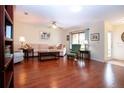 Spacious living room with hardwood floors and ample natural light at 1623 Faxton Dr, Sun City Center, FL 33573