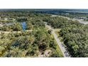 Spacious lot with a pond and road access at 397 Doniphan Dr, Port Charlotte, FL 33954