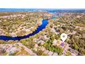 Aerial view showcasing home location by waterway at 5714 Olive Dr, New Port Richey, FL 34652