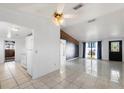 Open concept living room and kitchen area at 9102 Post Oak Ct, Tampa, FL 33615