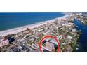 Aerial view showing home's location near the beach and waterways at 3505 Casablanca Ave, St Pete Beach, FL 33706