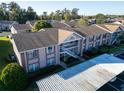 Complex of condo buildings, parking and landscaping at 4805 Sunnybrook Dr # 21, New Port Richey, FL 34653