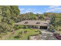 Lovely single Gathering home featuring attached garage and beautiful yard in Seminole Florida at 5105 N 45Th St, Tampa, FL 33610