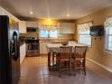 Kitchen boasts stainless steel appliances and an island at 10863 112Th Pl, Largo, FL 33778