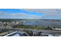 Aerial view showcasing waterfront, road, and park at 17920 Gulf Blvd # 1508, Redington Shores, FL 33708