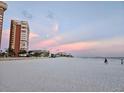 Scenic beach view with condo building and sunset at 17920 Gulf Blvd # 1508, Redington Shores, FL 33708