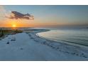 Scenic beach with calm waters at sunset at 800 Collany Rd # 605 & 606, Tierra Verde, FL 33715