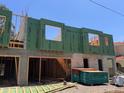 New construction site showing the Zip System sheathing and framing of a modern home at 3012 S Esperanza Ave, Tampa, FL 33629