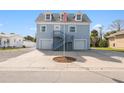 Two-story house with double garage and a spacious driveway at 4148 Rudder Way, New Port Richey, FL 34652