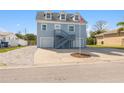 Two-story house with double garage and a spacious driveway at 4148 Rudder Way, New Port Richey, FL 34652