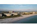 Aerial view of beachfront condo building and ocean at 6363 Gulf Winds Dr # 435, St Pete Beach, FL 33706