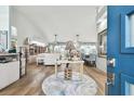 Bright living room with hardwood floors and open floor plan at 1903 Gulf Beach Blvd, Tarpon Springs, FL 34689