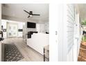 Bright living room with an open floor plan and modern decor at 1779 Shore Acres Ne Blvd, St Petersburg, FL 33703