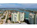 High-rise condo building on waterfront with pool and parking at 400 64 Ave # 1207, St Pete Beach, FL 33706