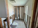 Bathroom under renovation with new tile and a toilet at 3960 Headsail Dr, New Port Richey, FL 34652