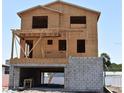 An in-progress build of a two story home showing cinder block foundation and wood frame at 840 61St Ne Ave, St Petersburg, FL 33703