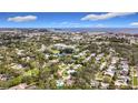 Aerial view of neighborhood, showcasing surrounding homes and landscape at 2358 Havana Dr, Clearwater, FL 33764