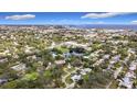 Aerial view of neighborhood, showcasing surrounding homes and landscape at 2358 Havana Dr, Clearwater, FL 33764