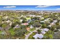 Aerial view of neighborhood, showcasing surrounding homes and landscape at 2358 Havana Dr, Clearwater, FL 33764