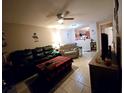 Open living room and kitchen area with a Christmas tree at 2302 Maki Rd # 5, Plant City, FL 33563