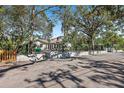 Charming house with a well-manicured lawn and a wooden fence at 5021 24Th S Ave, Gulfport, FL 33707
