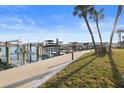 A scenic view of the community's boat dock, with multiple boat slips and easy access to the water at 400 64Th Ave # 908, St Pete Beach, FL 33706