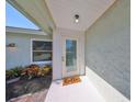 Inviting entryway with a new door and tile flooring at 5841 27Th S St, St Petersburg, FL 33712