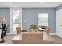 Simple dining area with a table set for four at 5021 69Th N Way, St Petersburg, FL 33709
